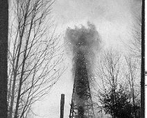 Oil well 2-Short Tract Scenes at the Oil Rig; Virginia states: "My grandfather wrote on back of picture--'Grapevine well #1, Vanostrand farm drilled in Oct 24, 1906. Flowed natural...