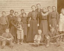 Grandmother at school in AlmondCopy "My Grandmother Ethel Karr standing to the left of the teacher, to the left and in front of Ethel is her brother, Garland Karr smiling. They are at a one room...