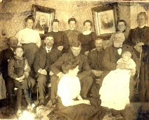 Karr family with uncle DickCopy "In this picture my Grandmother, Ethel Karr Bean is seated on the Floor, Behind her is my Grandfather Berten B Bean, to the left of him is Charles Karr. The...