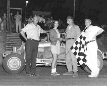 Ulysses - 5 Another Winner at Mills, PA - Sportsman Raceway --At left is Gaylord Miller (Track Owner/Operator), daughter Floy Miller Donovan, Carl Burrows & Starter, Whitey...