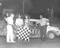 Ulysses - 3 Above, (L-R) Whitey Roboski, Stub Weigartz of Allegany, Winning Driver of Car 331, Floy Donovan presenting trophy, and Gaylord Miller, Track Owner. Sources...