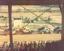 Wellsville Raceway - Monroe 5 9/16 dead center - Dean Layfield; Inside 9/16 is Red/White #96 Dutch Hoag of Bath (Per Ford Easton).