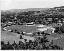 Wellsville Raceway c_1948-9 Photo of Raceway, Ed Schwalb Studio, Wellsville c. 1940's; Just prior to start of auto racing it is believed. A neat 1/2 mile........ Wellsville, NY As viewers...