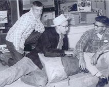 Canoe03 (L->R): Jim Walsh, Bill McQueen and Frank Cady chatting on Palmer's store porch prior to departure.