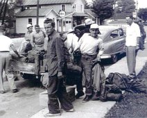 Canoe04 Loading the trailer prior to departure. Known young men facing camera: (L->R): Jim Moreland (w/white hat) , Frank Cady, Larry Wightman (closest to camera),...