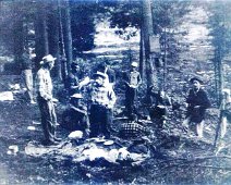 Canoe13 Cleaning up after chow. Excepting for Jim Walsh on the left, I am unsure of the identity of the other Scouts in this photo.