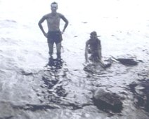 Canoe16 Ward Guild (standing) and Dick Ryan taking a swim break