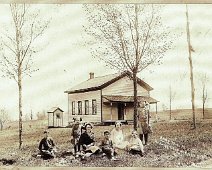 Alma Hill School 1912 (Photo from 2002 Report of Norman Ives, Historian, Town of Alma) Alma Hill School about 1912. Seated: Johnny Mesler, Mary Bellamy(teacher), Raymond Mesler,...