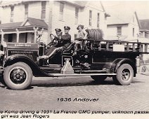 FireDept07 1936 Andover - Archie Kemp driving a 1931 La France GMC pumper, unknown passenger. Little girl was Jean Rogers.