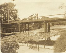 TemporaryBridge This scan shows a bunch of kids standing on the temporary bridge. Work started on its replacement October 1, 1932 when it became necessary to replace a fairly...