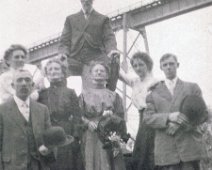 at the trestle 1920's: At the Trestle. Emma Wafler Evans in the center w/big hat; Dan Evans behind her. Submitted by Gerrie Evans Raw