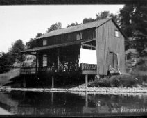 photo_editor_ds_1637374018843 Lake house on Lake Cuba (most likely) on porch L-R Estelle Wilcox, Flora Fay Wilcox, Thomas Fisher Wilcox