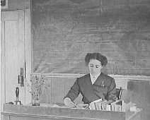 Miss Nellie Strong at her desk Teacher, Nellie Strong, at her desk from Nellie Strong Pitts Collection; Submitted by Diane Pitts