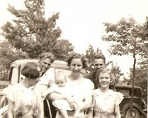 District_3_e Front Children: Leora Gelser, Ann Maker Ira Gelser. Second Row: Gladys Gelser, Margaret Ringelberg holding Mary Maker, Thelma Gelser. Back, Hank Ringelberg,...