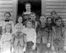 District_3_i IRA & CALVIN WEAVER'S SCHOOL CLASS Teacher, Grace Bradley. Back Row: Lottie Moses, Blanch Parker, Ed Young, Calvin Weaver, Unknown, Willie Weaver. Front Row:...