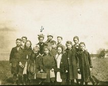 Bea Gleason & school mates "School photo is from about 1918. Arrow pointing down at Beatrice Gleason. Teacher may have been Mrs. Ula Mae Champion. Photo is from Beatrice Gleason's album....