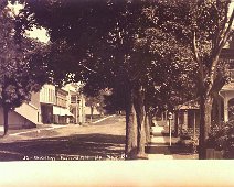 32_Kellogg-Rushford Unused postcard. Photographer is P. H. Kellogg Rushford NY view Entitled UP MAIN ST.