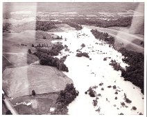 LakeAtSoTierExprwy-Almond At Almond,NY; The So.Tier Expressway being constructed serves as dam for a new lake.....thus, Almond suffers further damage. Photo by Dick Neal