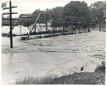 LosingMillerStBridge Miller Street Bridge near washout! Photo by Dick Neal.