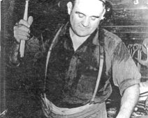 Blacksmith at Work- Is this Mr. Ross Wellsville Blacksmith at work.