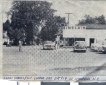 HarryGravesDlr Harry Graves Dealership, early 1950s; Surveyor for highway in view.