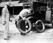 JosephVLeonardHavingTireChanged Joseph V. Leonard having tire changed