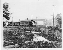 IMG_0006 Passenger Train at the Whitesville Station on West Main Street. It is said that the lumber from tearing down this Station was used to build the house which sits...